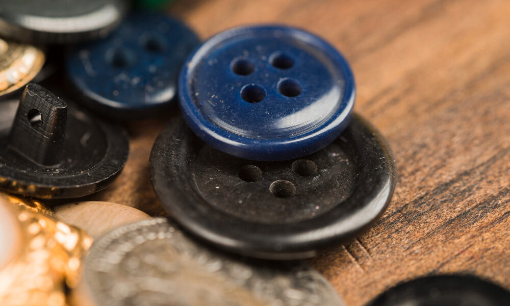Como escolher o melhor fornecedor de botões para grandes produções têxteis